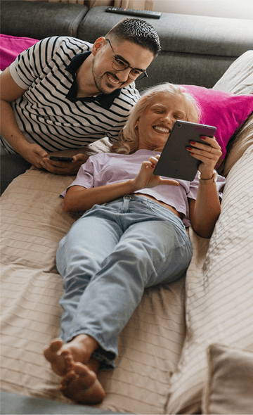 Couple relaxing on a sofa