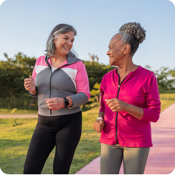 Two people jogging and conversing
