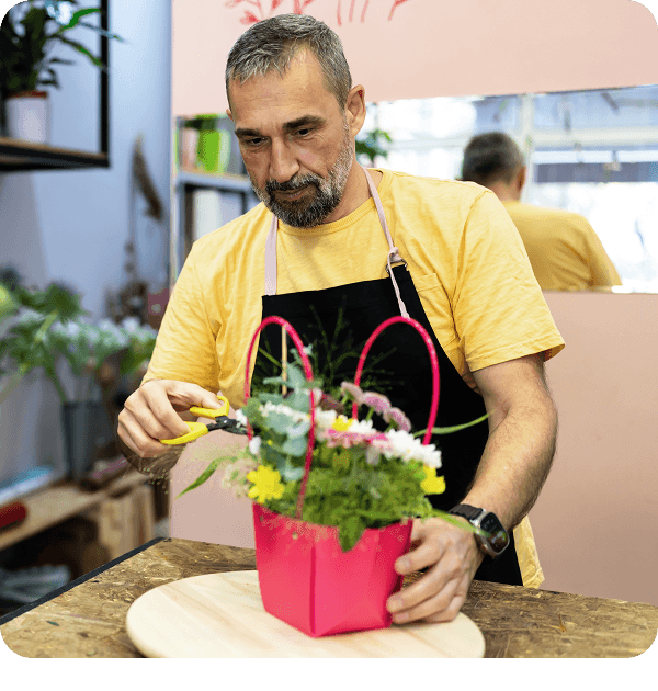 A person cutting flowers